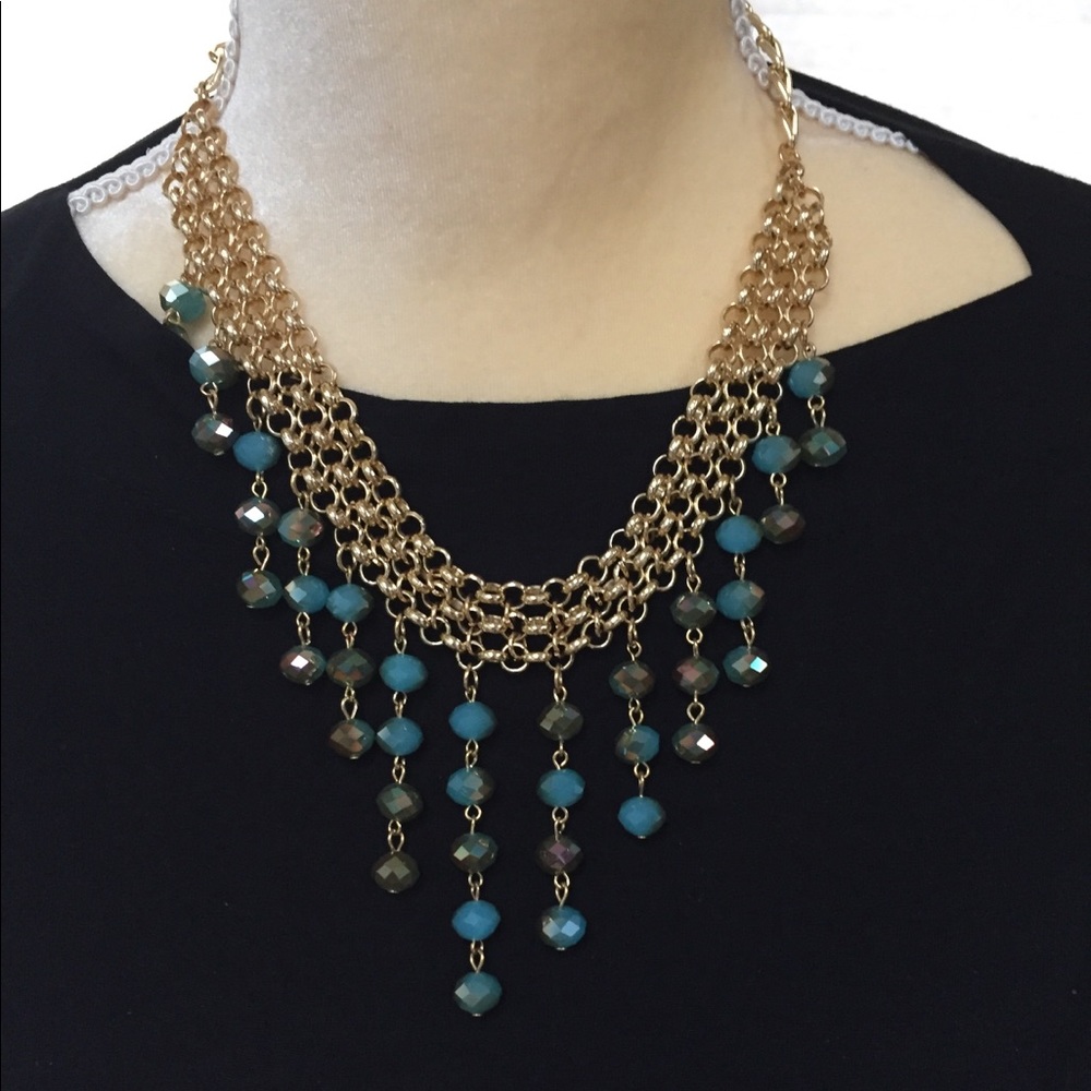 Beaded fringe necklace and matching earrings.